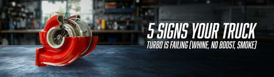 Cut-away diesel turbocharger with red compressor housing displayed on a workshop bench, showing internal compressor wheel and bearing assembly. Text reads: 5 Signs Your Truck Turbo Is Failing
