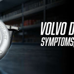 Volvo Holset turbocharger unit displayed on a shop floor with parts shelving in background. Text reads: Volvo D13 Turbo Failure: Symptoms, Causes & Repair Options