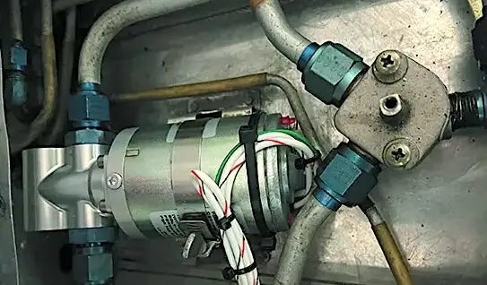 Close-up of mechanical components with wires and metal parts